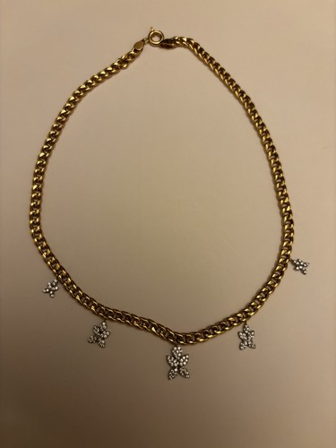 Caret yellow gold necklace - caret,